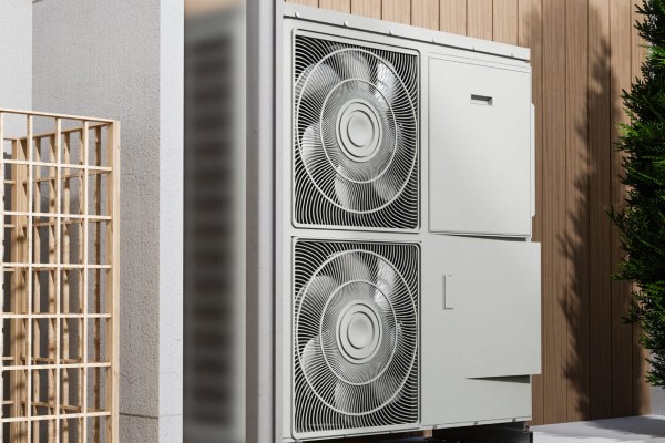 A large white HVAC machine with cooling fans